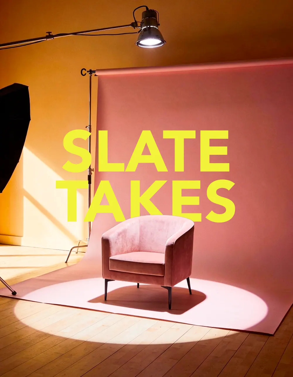 Slate Takes title art over a pink armchair in a spotlight