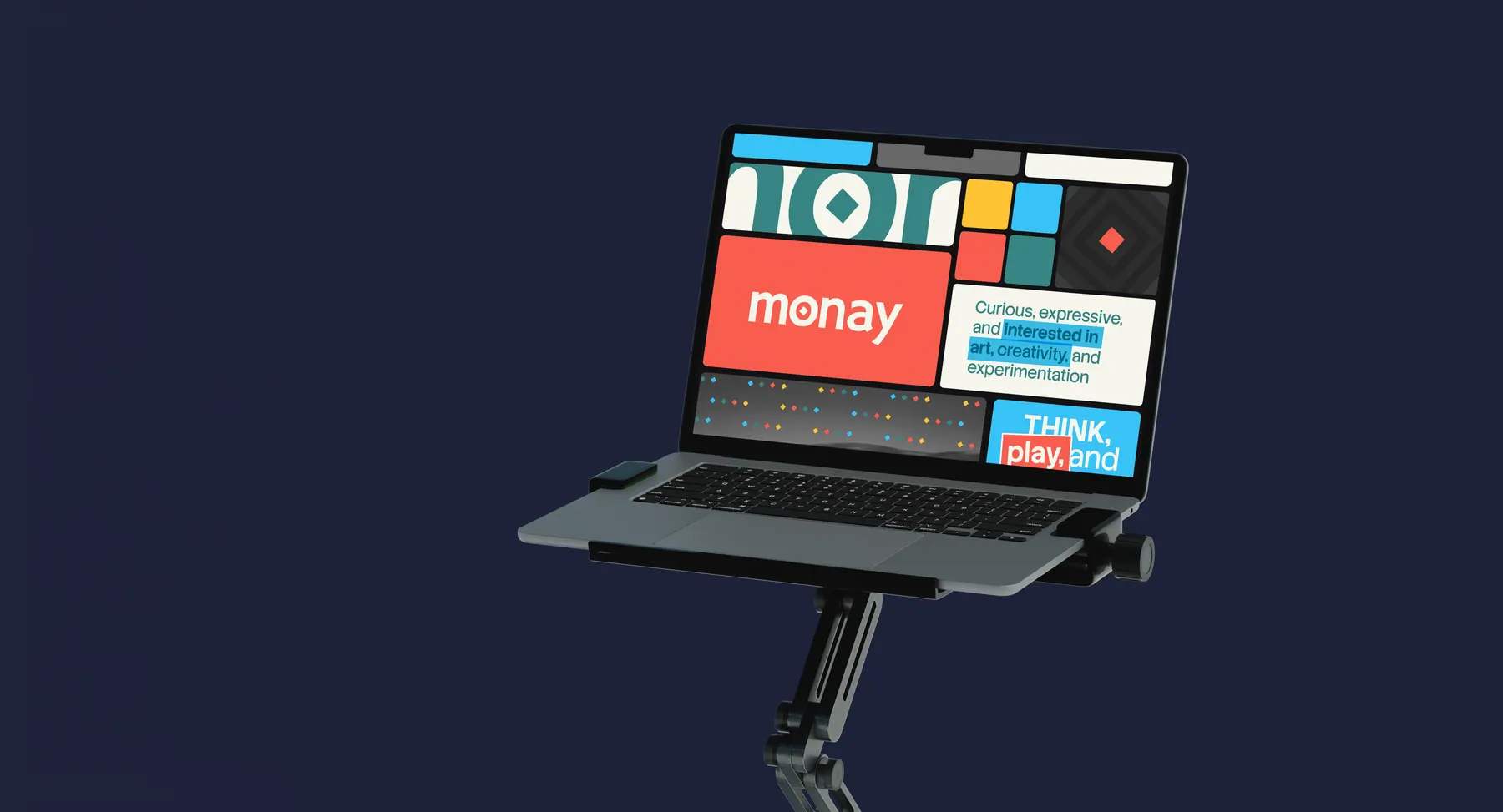 The Monay site on a laptop against navy