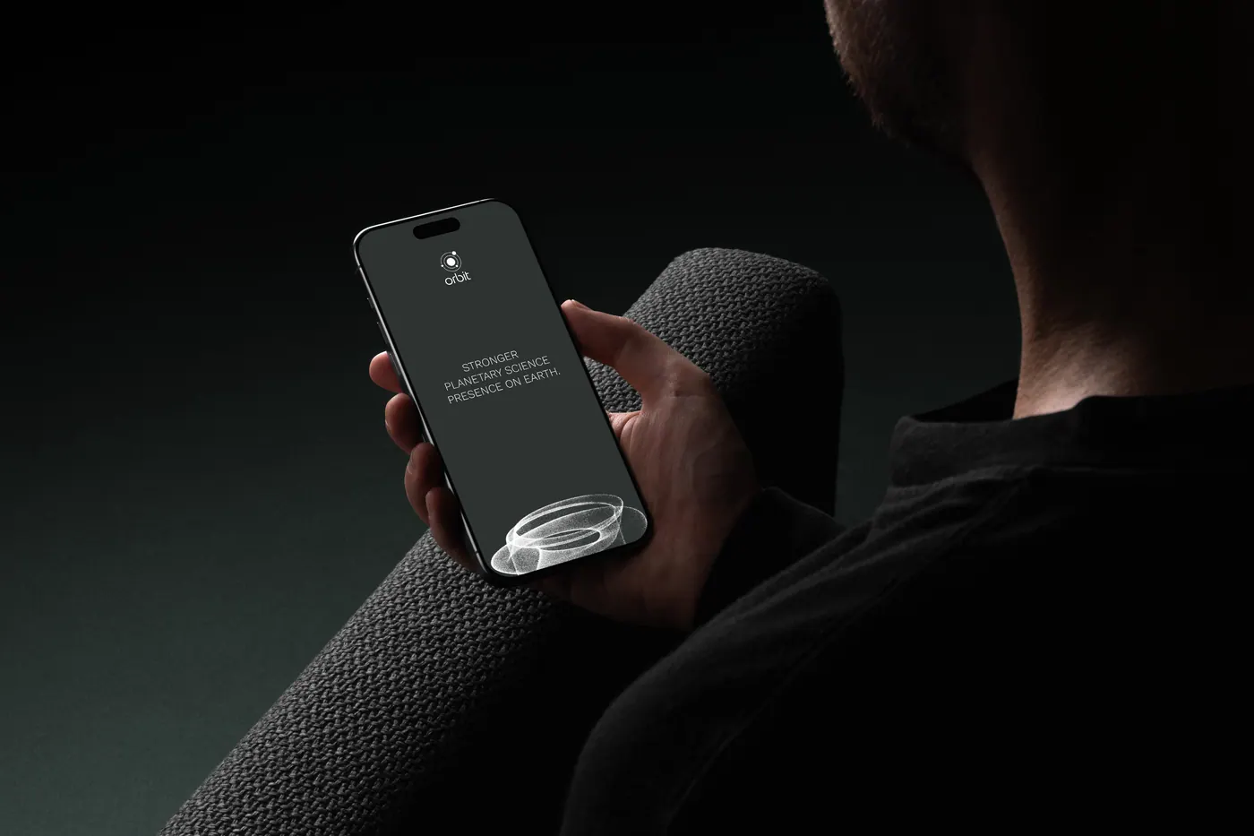 The Orbit app on a phone in a dark room